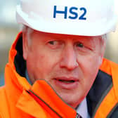 File photo dated 11/02/20 of Prime Minister Boris Johnson during a visit to Curzon Street railway station in Birmingham where the HS2 rail project is under construction. December 13th 2020 marks the first anniversary of Mr Johnson's General Election win. Photo: PA