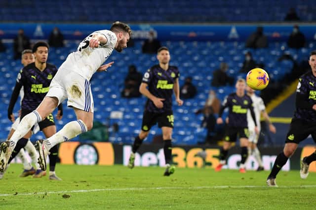 Stuart Dallas heads home Mateusz Klich's cross. Photo by Stu Forster/Getty Images.