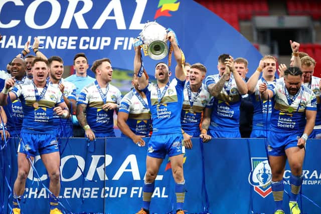 Luke Gale lifts the Challenge Cup. Picture by Michael Steele/Getty Images.