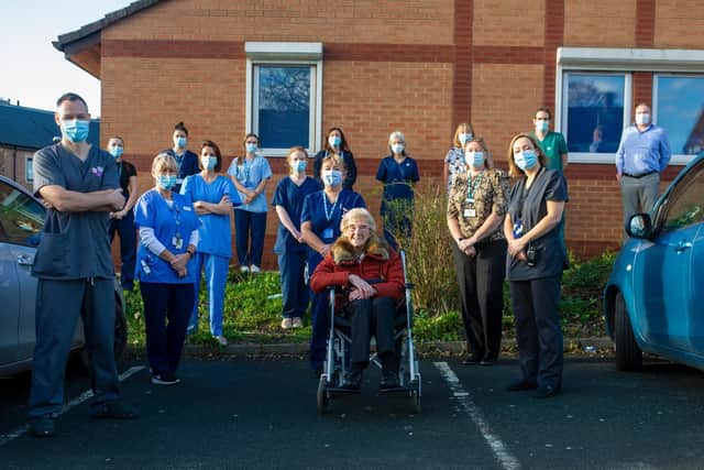 Marjorie with GPs and staff at The Grange Medical Centre in Seacroft (Image: Tony Johnson)