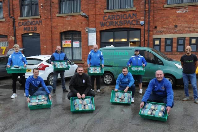 Morley Town AFC management and players with the food parcels to be distributed. (left to right): Craig Wood, Lee Kioseff, Robert Wheelhouse, Kevin Mackay of Rethink Food, James Wheelhouse, Matthew Agar, Neil Holdsworth, Noel Bullock and Sat Mann of Lean Lunch