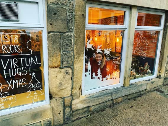 The Old King's Arms landlady Lyndsey Acaster-Clarke has decorated the pub window in support of the young musicians