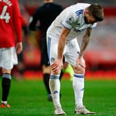 Leeds United's Stuart Dallas reacts following the full-time whistle at Old Trafford. Pic: Getty