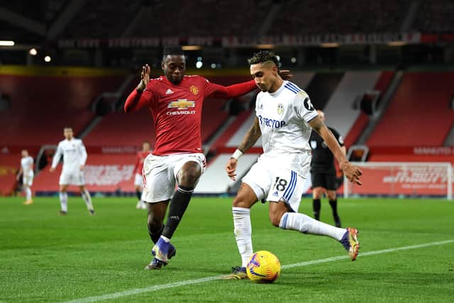 Man of the match contender Raphinha is challenged by Aaron Wan-Bissaka of Manchester United. Picture: Michael Regan/Getty Images.