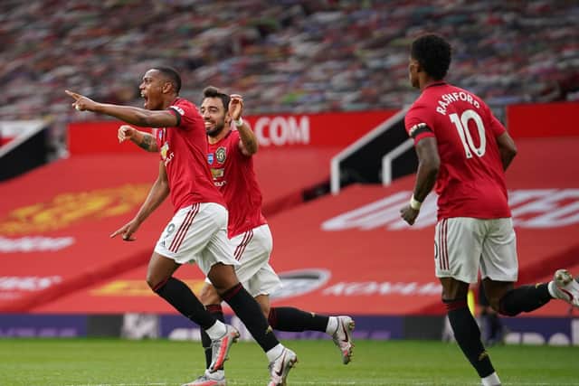 BIG THREE: Manchester United trio Bruno Fernandes, centre, Anthony Martial, left, and Marcus Rashford, right, are three of the first four in the first scorer market for today's hosting of Leeds United. Photo by Dave Thompson/Pool via Getty Images.