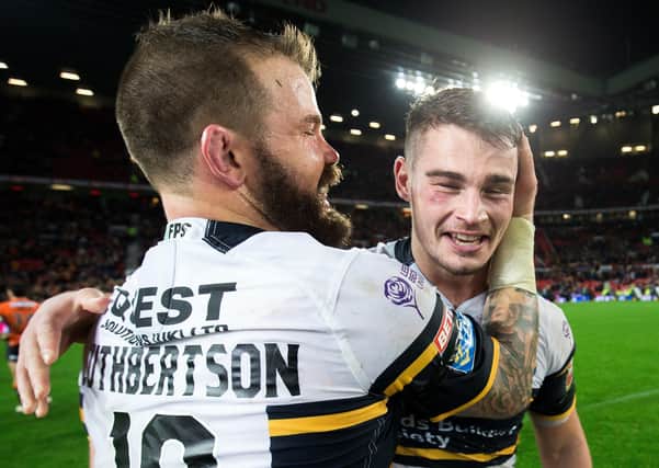 Departing stars Adam Cuthbertson and Stevie Ward celebrate Leeds Rhinos' Grand Final victory over Castleford Tigers in 2017. Picture: Alex Whitehead/SWpix.com.