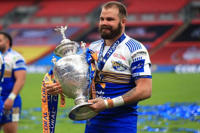 Leeds Rhinos' Adam Cuthbertson with thee Challenge Cup trophy back in October. Picture: Mike Egerton/PA Wire.