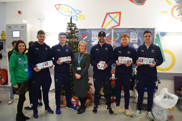 Yorkshire County Cricket Club players pictured dopnating Christmas presents at Leeds Children's Hospital in 2019.