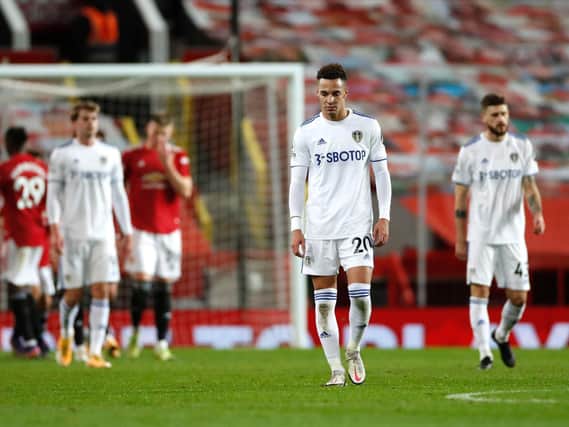 Leeds United players react during Manchester United's 6-2 win at Old Trafford. Pic: Getty