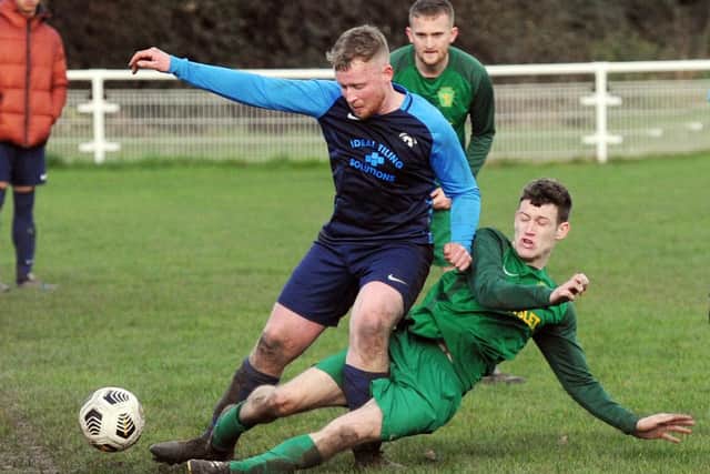 Jordan Duncan, of Hunslet Club, tackles Wykebeck Arms' Paddy Gibbons. Picture: Steve Riding.