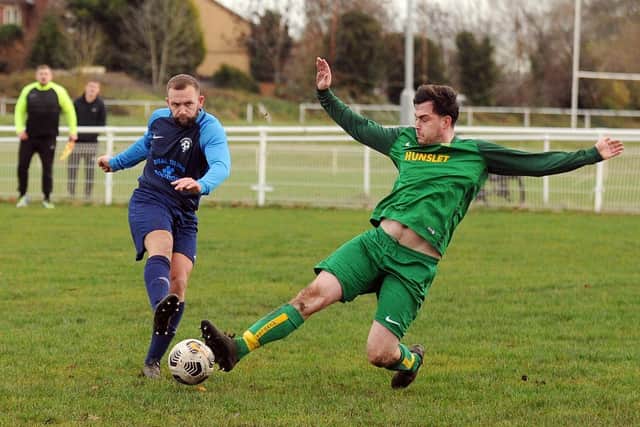 Kingsley Wetherald, of Wykebeck Arms, has his shot stopped by Hunslet Club's Jamie Claughton. Picture: Steve Riding.