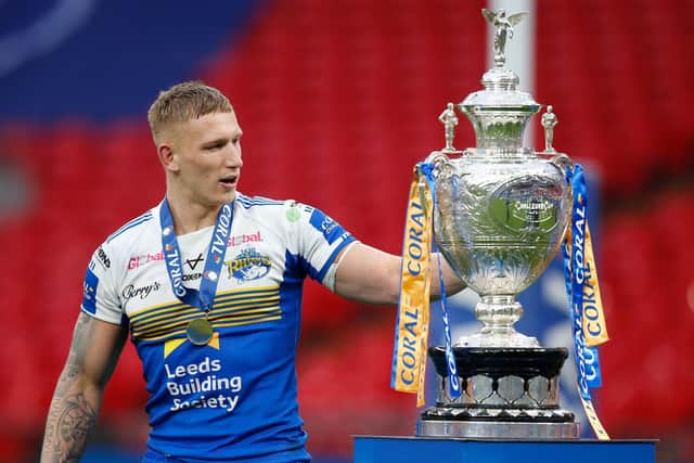 COMING THROUGH: Leeds Rhinos' Mikolaj Oledzki celebrates with The Challenge Cup trophy at Wembley. Picture by Ed Sykes/SWpix.com