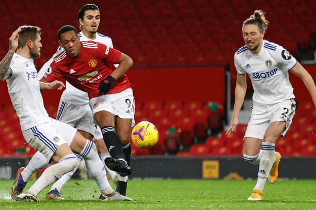 HANDFUL: Manchester United's Anthony Martial gets away from Leeds United's Liam Cooper, Pascal Struijk and Luke Ayling only to miss the chance in Sunday's clash at Old Trafford. (Photo by CLIVE BRUNSKILL/POOL/AFP via Getty Images
