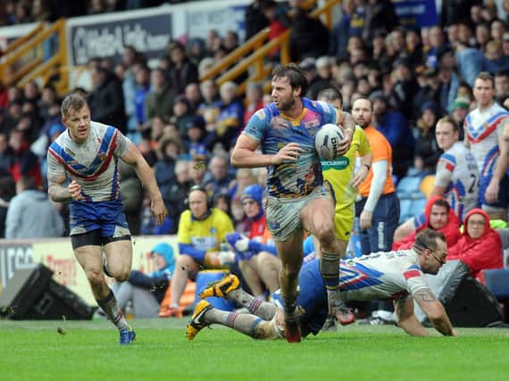 Mitch Achurch breaks through the Wakefield defence on Boxing Day, 2015. Picture by Steve Riding.