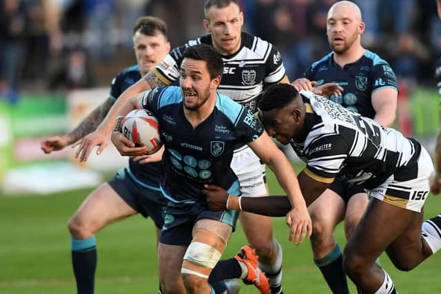 Tom Holmes on the attack for Rovers in a 2018 Challenge Cup tie against Hull. Picture by Jonathan Gawthorpe.