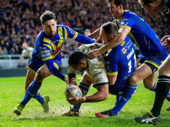 Ava Seumanufagai scores for Rhinos against Warrington in February. Picture by Bruce Rollinson.