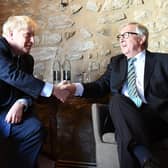 File photo dated 16/09/19 of Prime Minister Boris Johnson with European Commission President Jean-Claude Juncker, inside Le Bouquet Garni restaurant in Luxembourg, prior to a working lunch on Brexit. The UK and EU have reached a post-Brexit trade agreement (photo: PA).