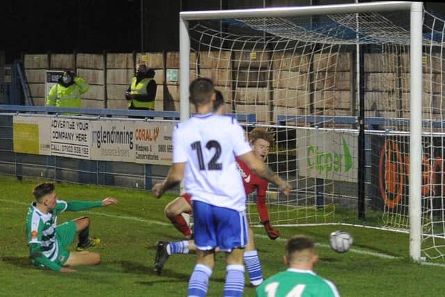 Farsley Celtic's Jake Charles hits the post in the last minute.
Picture: Steve Riding.