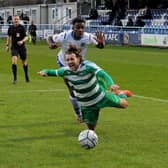 Luke Parkin of Farsley Celtic is brought down by 
Chukwudalu Molokwu of Guiseley for a penalty. Picture: Steve Riding.