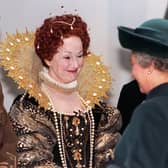 Actress Una Stubbs, in a costume of Queen Elizabeth 1, meets Queen Elizabeth 2 during her visit to Leeds for the opening of The Royal Armouries in March 1996.