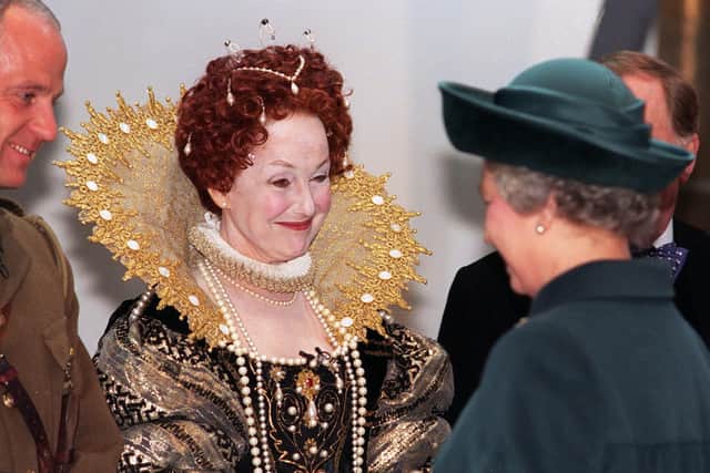 Actress Una Stubbs, in a costume of Queen Elizabeth 1, meets Queen Elizabeth 2 during her visit to Leeds for the opening of The Royal Armouries in March 1996.