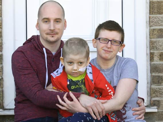 Hannah Richardson, five, who is battling acute lymphoblastic leukaemia, with parents Joseph Richardson and Allison Brown. Picture: Gary Longbottom