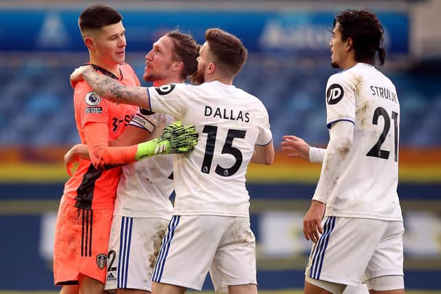 Leeds United goalkeeper Illan Meslier is congratulated by Luke Ayling and Stuart Dallas. Picture: Nigel French/PA Wire.