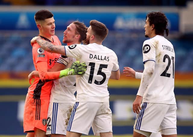 Leeds United goalkeeper Illan Meslier is congratulated by Luke Ayling and Stuart Dallas. Picture: Nigel French/PA Wire.