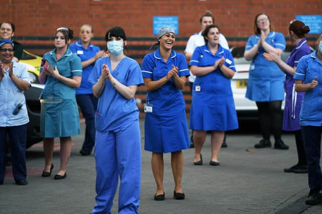 Leeds hospital staff during a Clap for Carers event earlier this year. Picture: Jonathan Gawthorpe