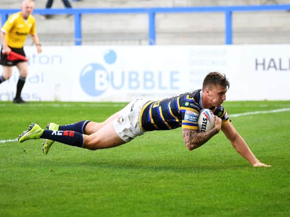 Alex Mellor scores for Rhinos during a Super League win over Hull KR in September. Picture by Jonathan Gawthorpe.