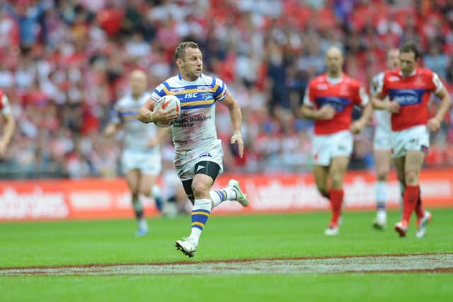 Rob Burrow scores for Rhinos in their 2015 Wembley win over Hull KR. Picture by Steve Riding.