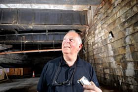 Michael Cox, deputy maintenance manager, in a room under the Queens Hotel in September 2011.