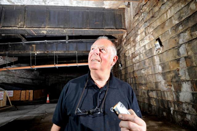 Michael Cox, deputy maintenance manager, in a room under the Queens Hotel in September 2011.