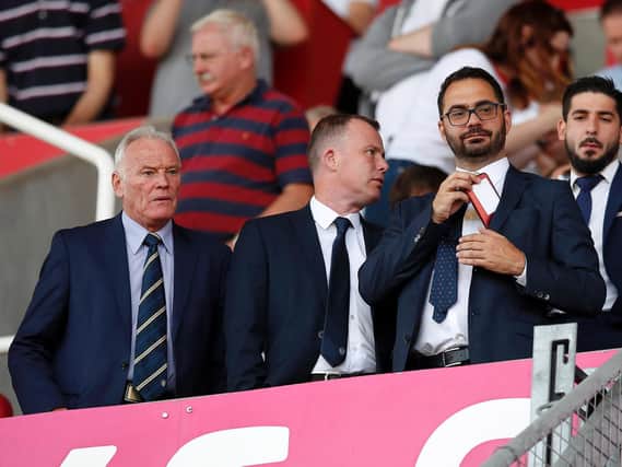 MR LEEDS - Eddie Gray, left, pictured with Leeds United CEO Angus Kinnear and director of football Victor Orta, endured a heartbreaking 2020 along with so many others, suffering the loss of friends and former colleagues who helped build the club's reputation. Pic: Getty