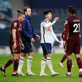 IMPRESSED: Tottenham Hotspur forward Son Heung-min embraces Leeds United centre-back Pascal Struijk after Saturday's 3-0 triumph in north London as Kalvin Phillips and Harry Kane look on. Photo by Ian Walton - Pool/Getty Images.