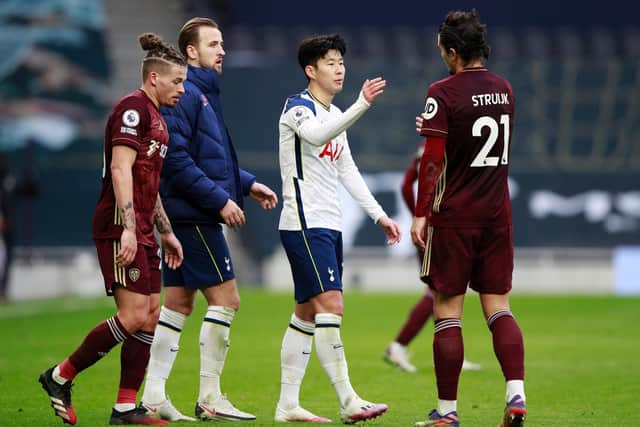 IMPRESSED: Tottenham Hotspur forward Son Heung-min embraces Leeds United centre-back Pascal Struijk after Saturday's 3-0 triumph in north London as Kalvin Phillips and Harry Kane look on. Photo by Ian Walton - Pool/Getty Images.