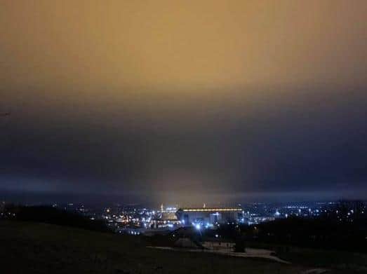 People across Leeds saw the orange glow in the skies on New Year's Eve. Ryan Hodge took this photograph of the glow coming from Elland Road stadium.