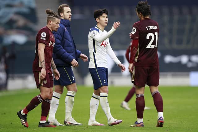 Tottenham Hotspur's Son Heung-min shakes hands with Leeds United's Pascal Struijk. Picture: Ian Walton/PA Wire.