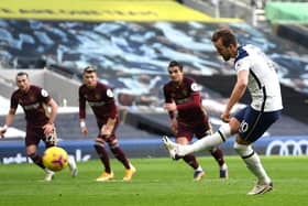 Tottenham Hotspur's Harry Kane scores his side's opening goal from the penalty spot. Picture: Andy Rain/PA Wire.