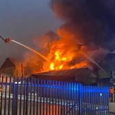 Firefighters have been working hard in bitterly cold conditions this morning to tackle a large building fire in Annison Street, Bradford.