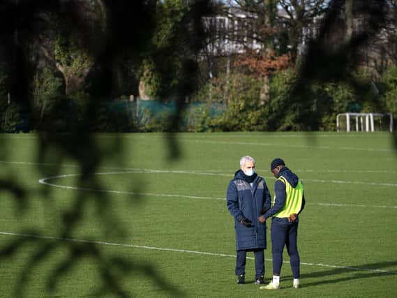 BOSS BACKING - FC Nantes head coach Raymond Domenech chats with former Leeds United loanee Jean-Kevin Augustin after a training session. Pic: Getty