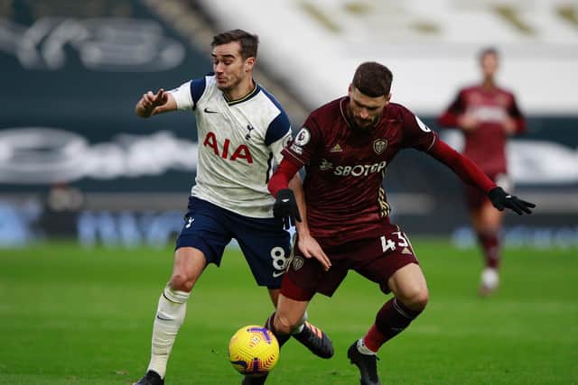 RELENTLESS: Whites midfielder Mateusz Klich, right, comes through yet another Leeds United test in Saturday's clash at Tottenham Hotspur as the Pole challenges Harry Winks. Photo by Ian Walton - Pool/Getty Images.
