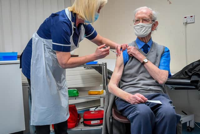 The Government has announced plans to delay giving people the second dose of the Covid vaccine in order to give as many people as possible the first dose. Pictured: Ralph Evans, 88, receiving the Oxford University/AstraZeneca COVID-19 vaccine at Pontcae Medical Practice in Merthyr Tydfil. PA.