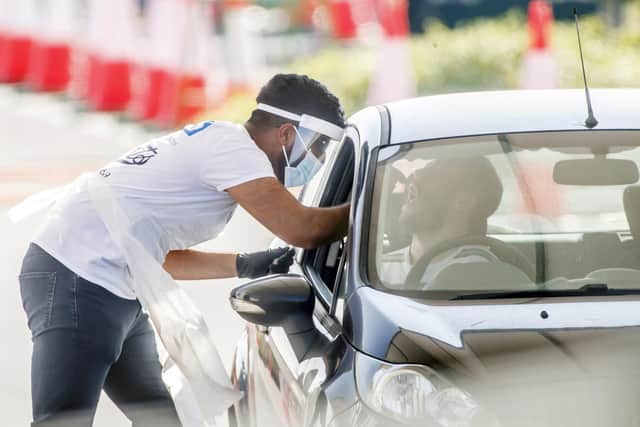 A man is tested for coronavirus at the Temple Green Park & Ride site in Leeds (Photo: Danny Lawson/PA Wire)