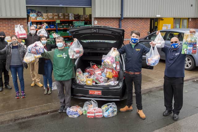 Chris Heard from Amber Cars in Leeds delivers food to Leeds North & West Foodbank in Leeds, Yorkshire, UK. Picture date: Friday December 18, 2020. Photo credit should read: Anthony Devlin