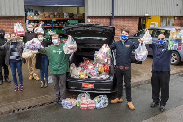 Chris Heard from Amber Cars in Leeds delivers food to Leeds North & West Foodbank in Leeds, Yorkshire, UK. Picture date: Friday December 18, 2020. Photo credit should read: Anthony Devlin