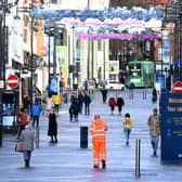 Signage in Leeds city centre reminds visitors about measures to reduce the spread of coronavirus. Picture: Simon Hulme