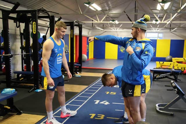 Harry Newman, left, working in Rhinos' gym this week, alongside assistant-coach Chev Walker and Callum McLelland, who is also recovering from surgery. Picture by Phil Daly.