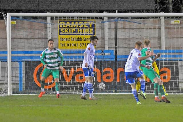 Nathan Powell equalises for Guiseley against Farsley Celtic on Boxing Day. Picture: Steve Riding.