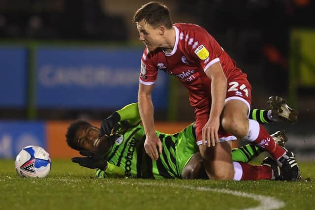 EXPERIENCED: Crawley Town's former Millwall defender Tony Craig, right, challenging Jayden Richardson of Forest Green Rovers last month. Photo by Harry Trump/Getty Images.